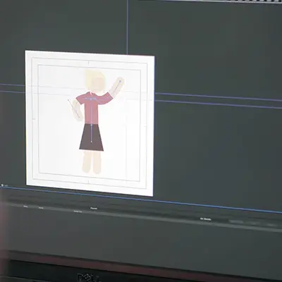 Computerscherm met animatiesoftware waarin een gestileerd vrouwelijk karakter wordt bewerkt; zichtbaar zijn een tijdlijn, richtlijnen en een canvas met het karakter in een pose met opgeheven arm.